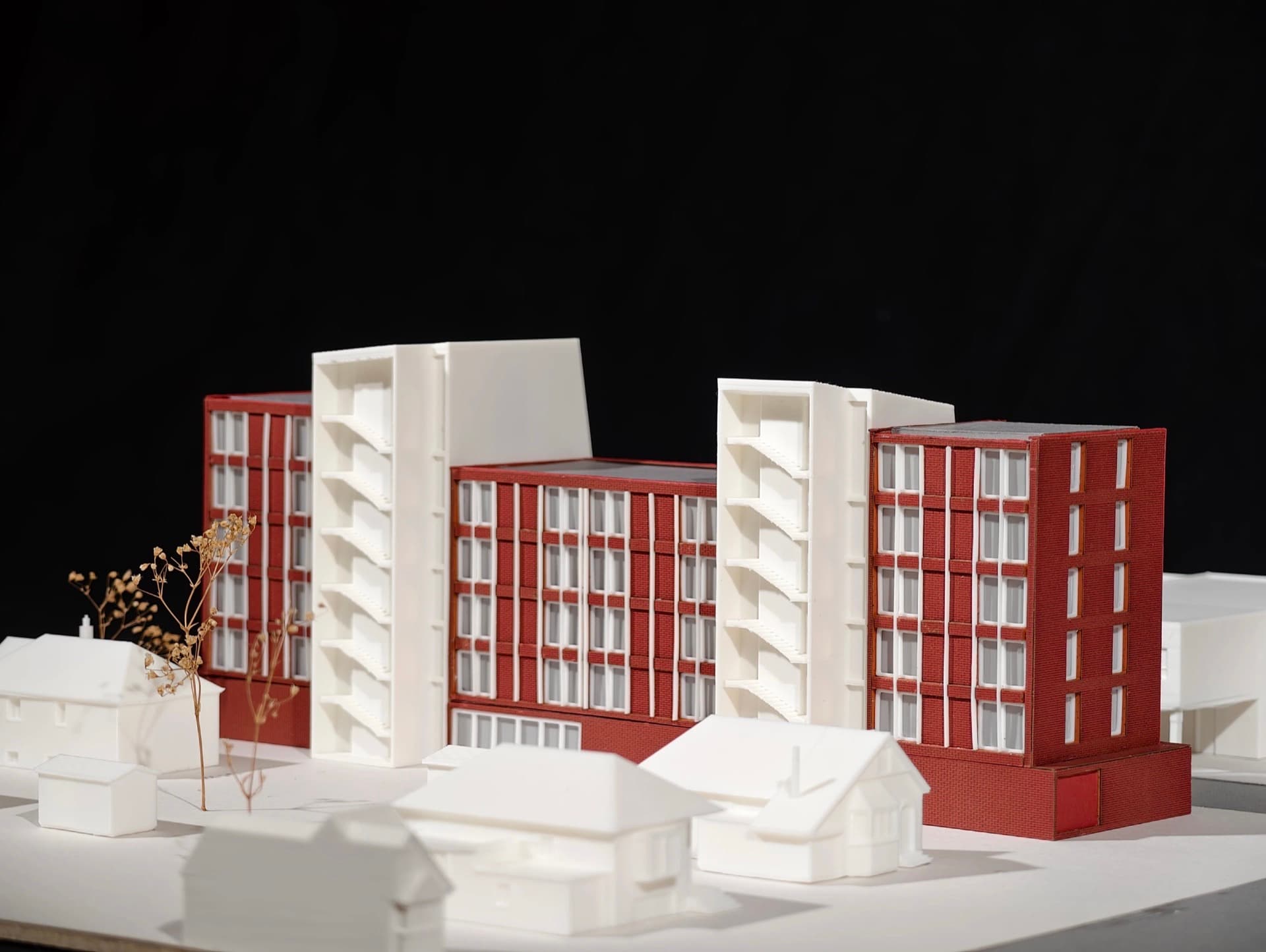 Mixed-Use Development — Multi-building residential complex with detailed brick facades and surrounding urban context