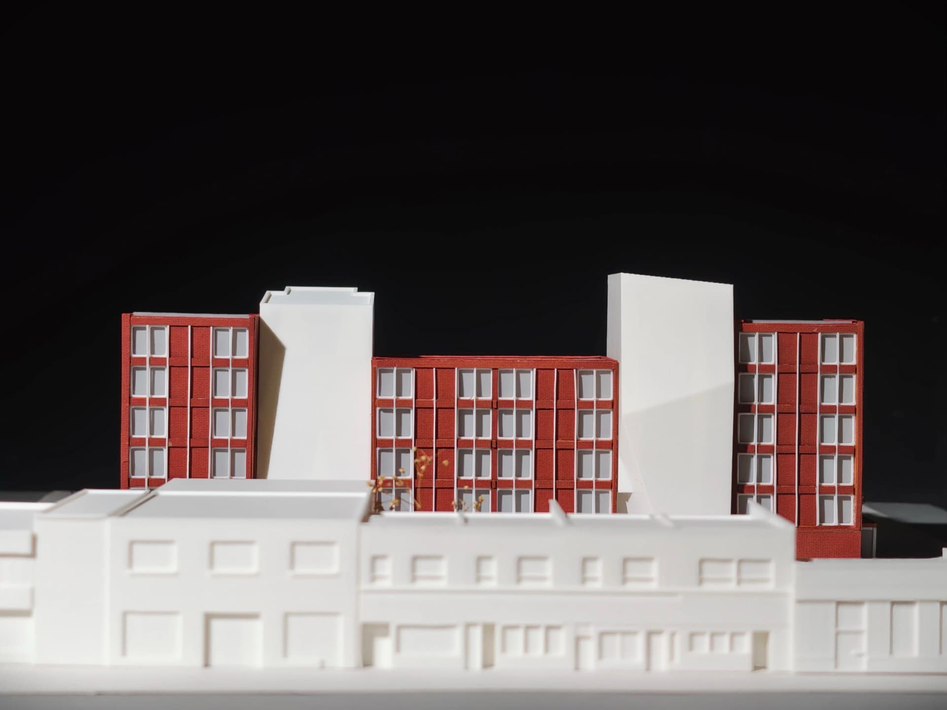 Mixed-Use Development — Multi-building residential complex with detailed brick facades and surrounding urban context